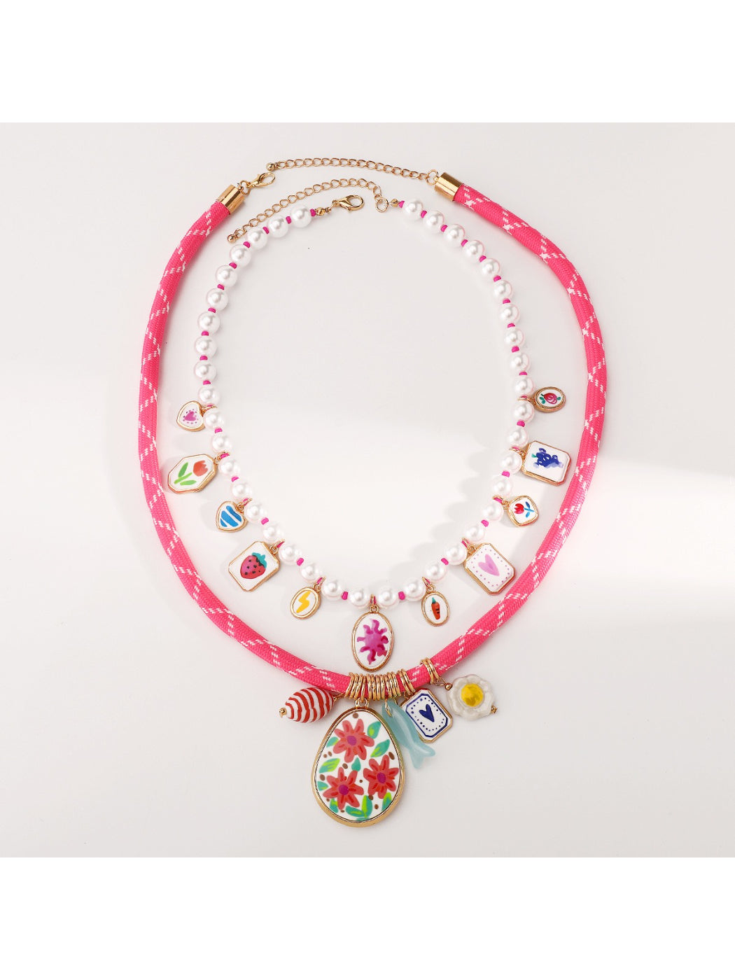 Side angle of Neckit Mixed Charm Beaded Necklace highlighting bead texture and charm design
