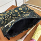 Cosbai dark floral cosmetic bag standing upright on a white surface