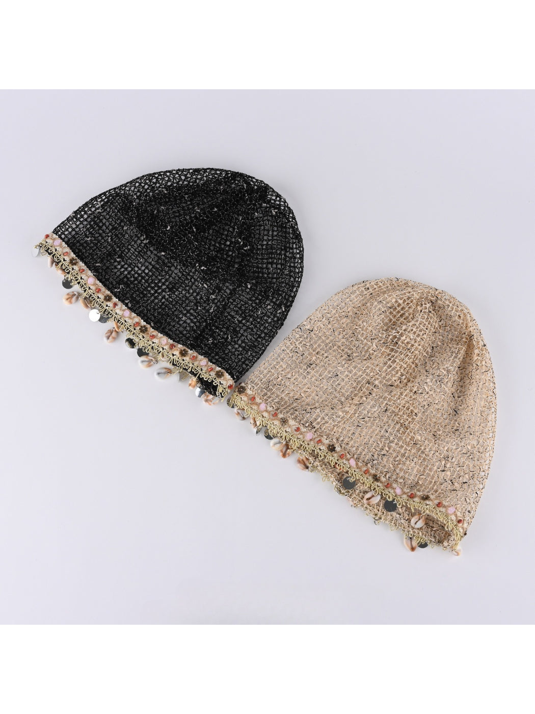 Close-up of Haila beanie showing detailed hollow out knit mesh shell pattern