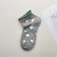 Rufia Dot Color Block Low Cut Socks worn on feet showing low cut style
