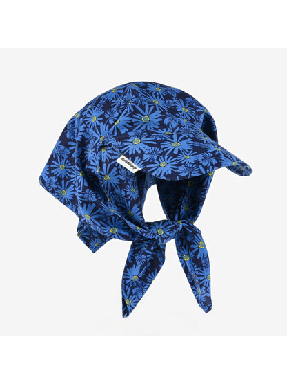 Front view of Haila visor cap with curved brim in solid color