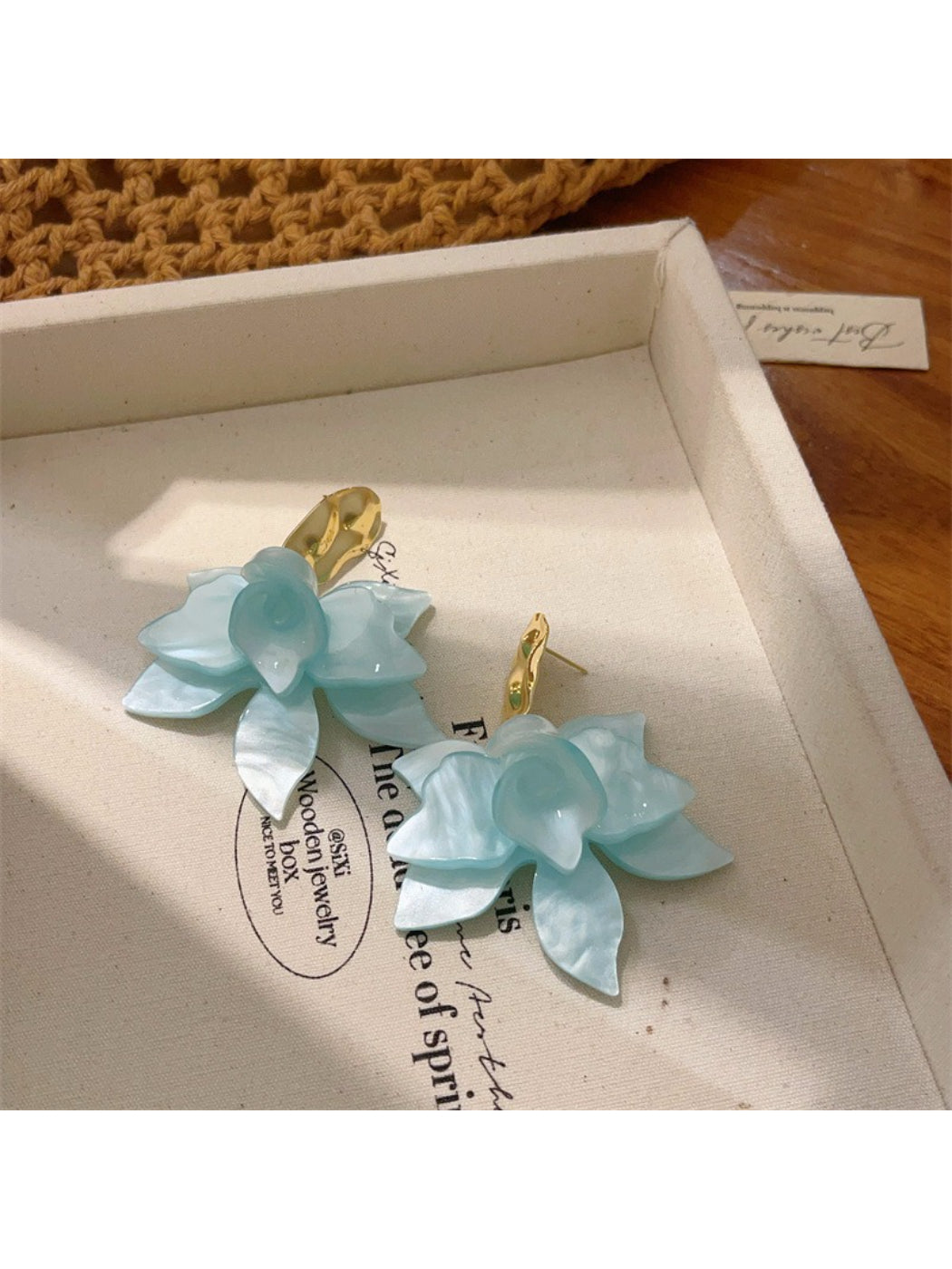 Close-up of the clasp and hook mechanism of the Earwish floral drop earrings