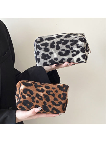 Cosbai leopard print makeup bag open showing spacious interior with makeup items