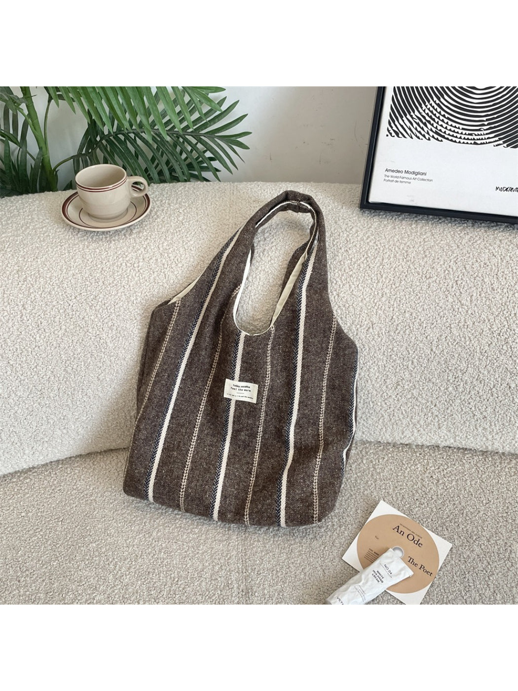 Cosbai vintage stripe slouchy tote bag with multicolor horizontal stripes on a white background