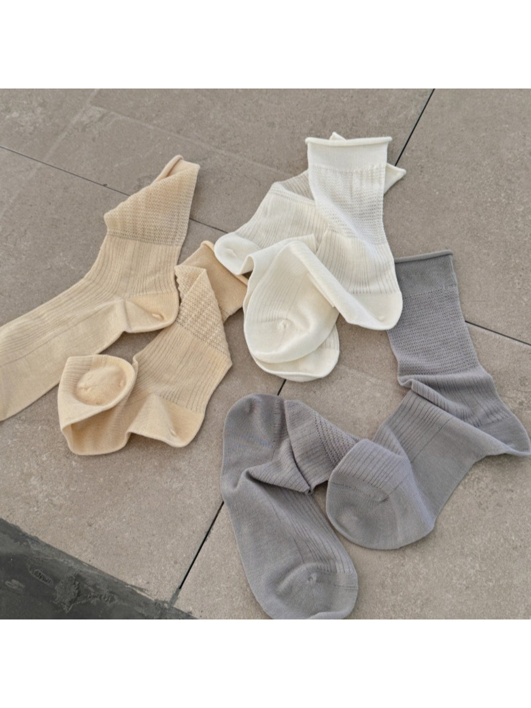 Rufia soft knit crew socks worn on feet with casual shoes