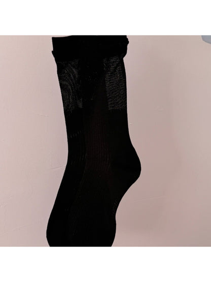 Rufia Loop Trim Ribbed Crew Socks paired with rolled-up jeans