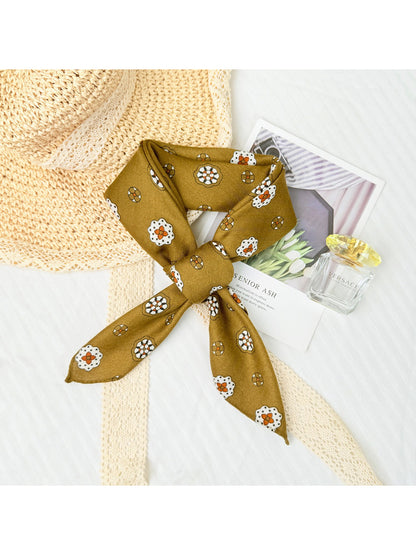 Close-up of Scarvii Mini Motif Bandana Square Scarf fabric texture and detailed motif design