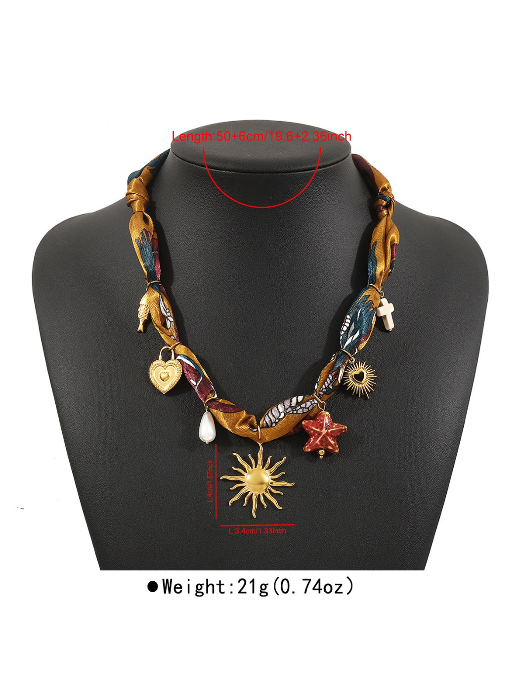 Close-up of boho fabric necklace showing intricate beadwork and charm details