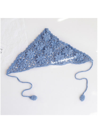 Model styling boho floral crochet headband with casual outfit outdoors