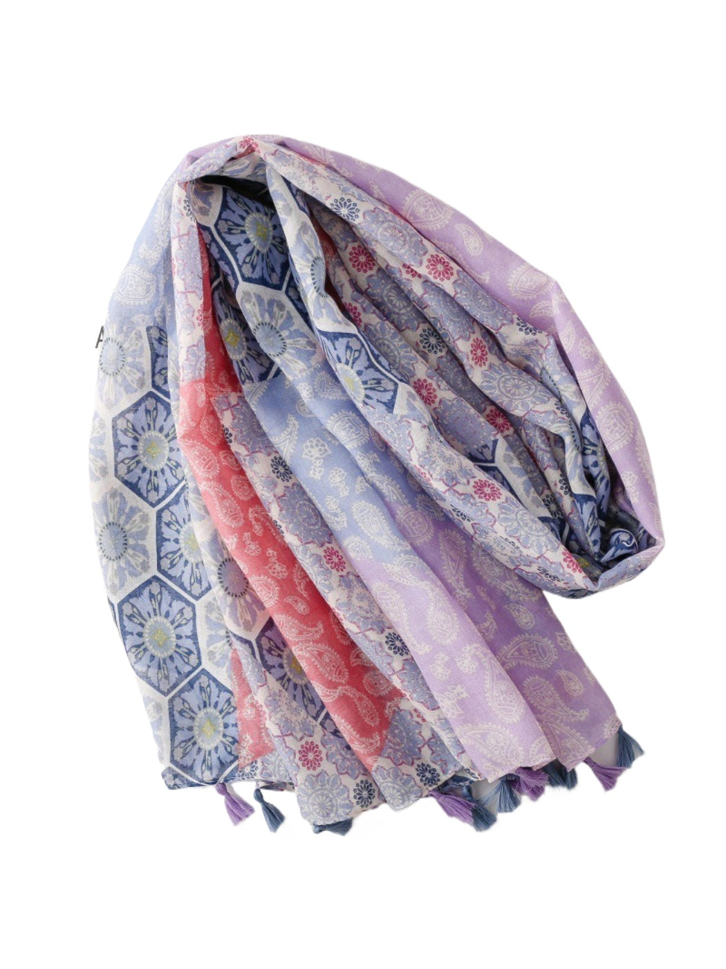 Close-up of pastel patchwork fabric and tassel details on scarf