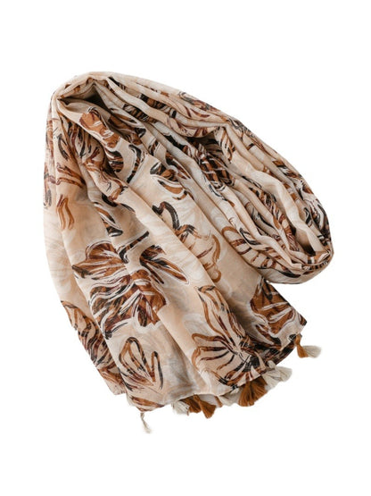Close-up of Scarvii botanical flower wrap scarf highlighting detailed flower prints and color tones