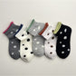 Rufia Dot Color Block Low Cut Socks in white with colorful dot pattern