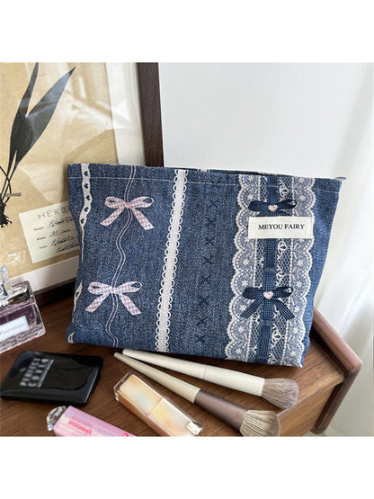 Close-up of vintage lace detail on Cosbai cosmetic pouch showing intricate floral pattern