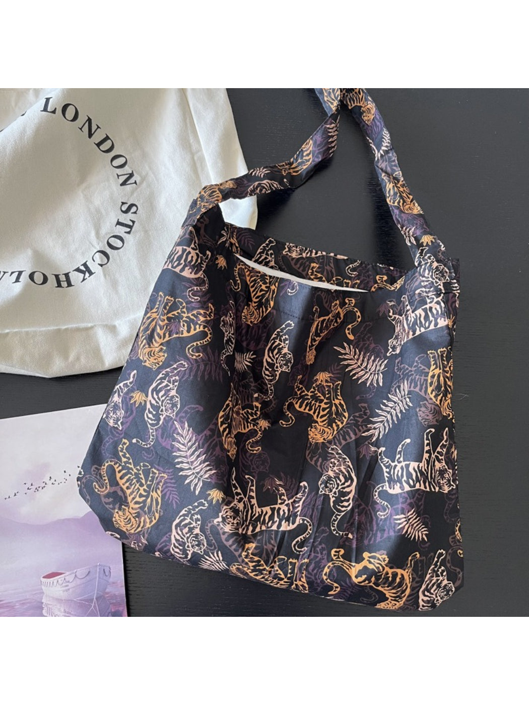 Back view of Cosbai Tiger Print Slouch Shoulder Bag highlighting smooth and strap attachment
