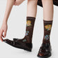 Rufia mesh floral mid-calf socks folded to show floral mesh pattern and mid-calf length