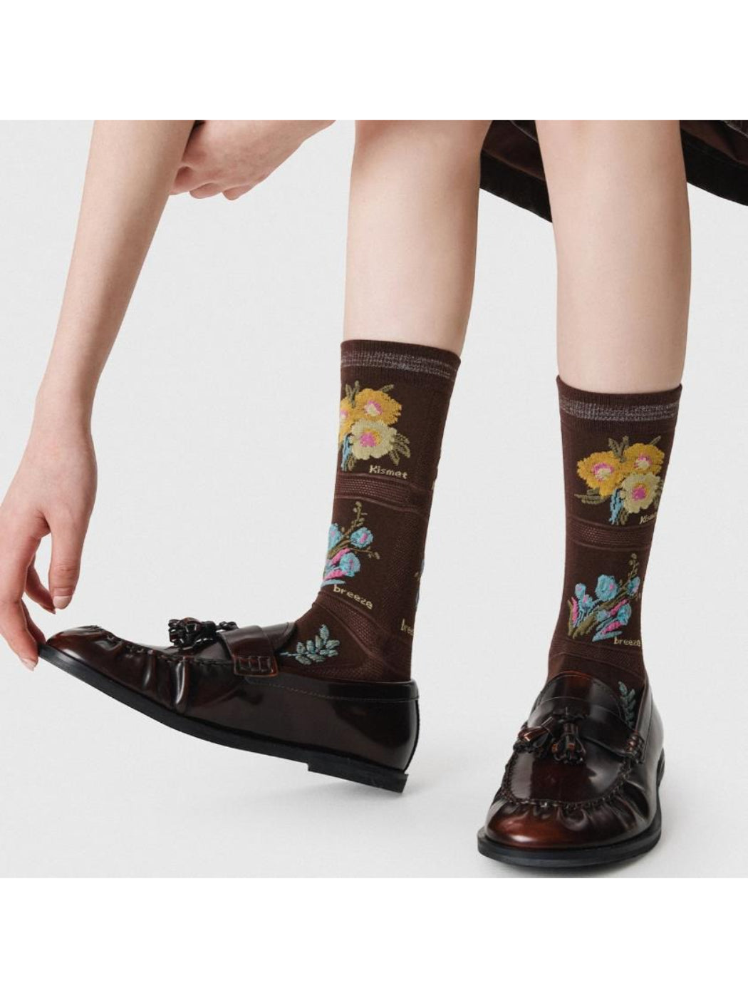 Rufia mesh floral mid-calf socks folded to show floral mesh pattern and mid-calf length