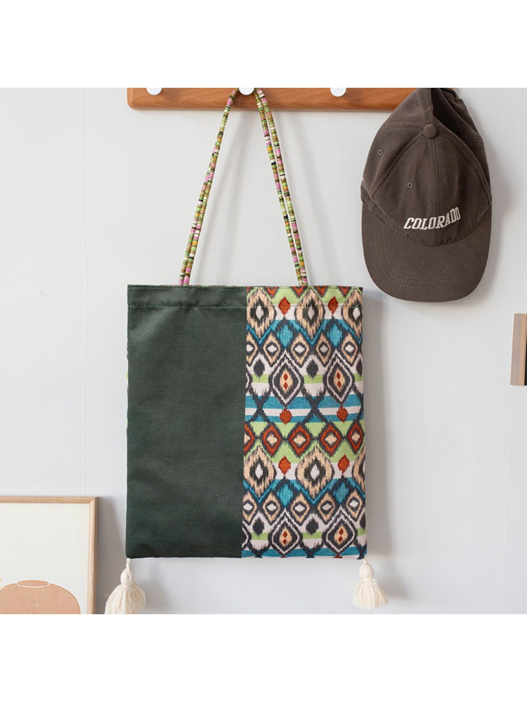 Cosbai Boho Ethnic Tassel Tote bag with vibrant ethnic print and tassels shown from front angle