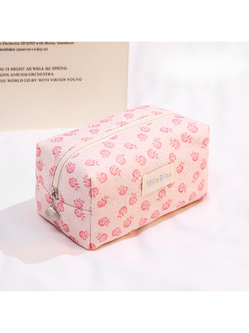 Side view of Cosbai printed travel cosmetic bag showing vibrant multicolor design