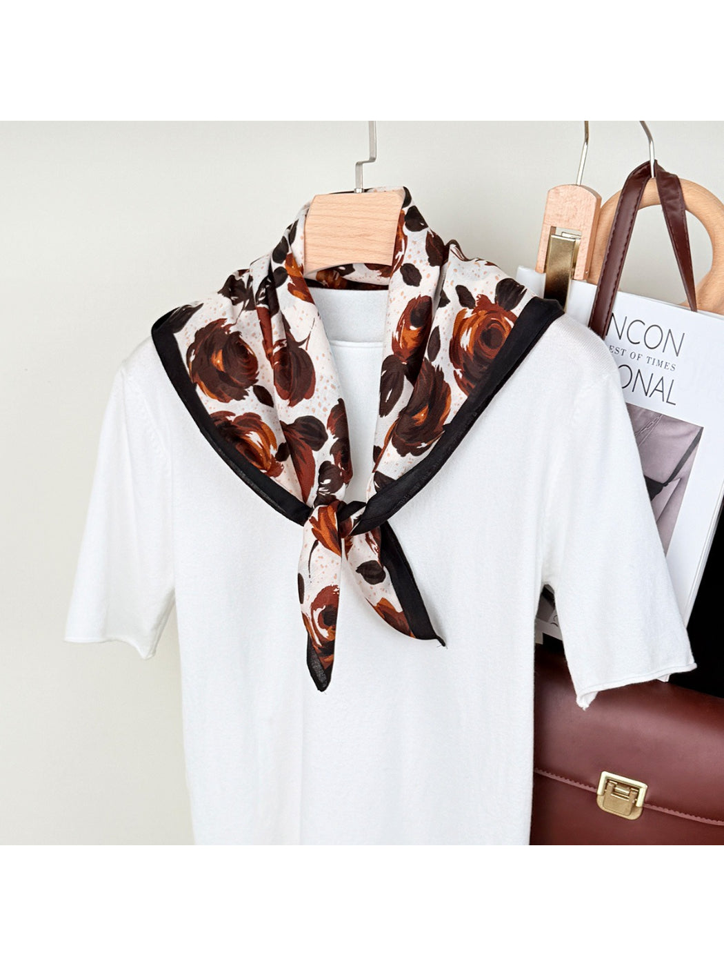 Scarvii rose print square scarf folded on white background