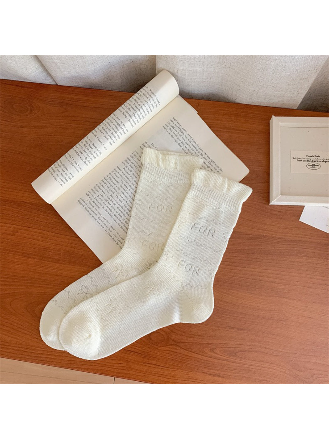 Rufia cherry open knit socks displayed flat showing full pattern and knit details
