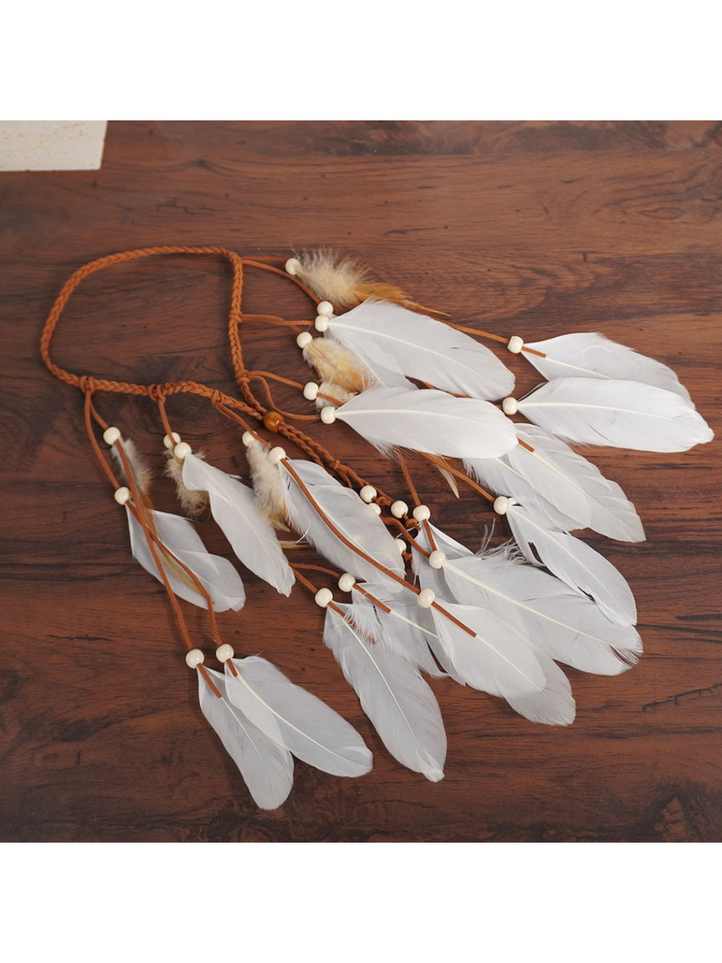 Hairish Boho multi drop feather hair headpiece with layered feathers on a thin band