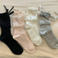 Rufia Ribbon Ruffle Crew Socks in white with delicate ribbon ruffle detail