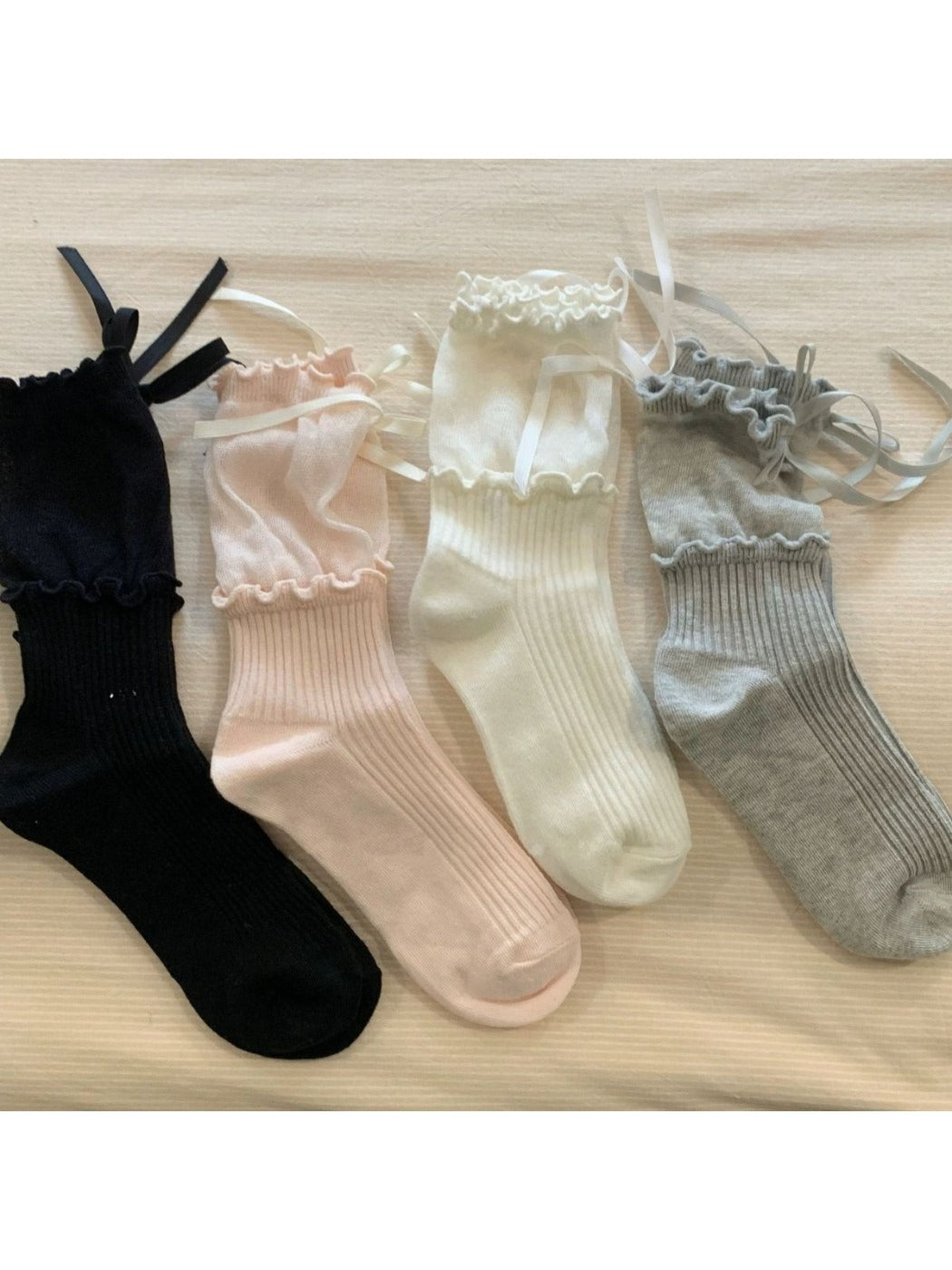Rufia Ribbon Ruffle Crew Socks in white with delicate ribbon ruffle detail