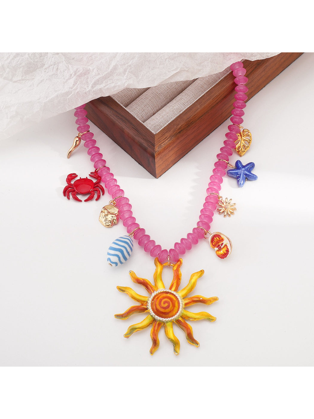 Model wearing Color Charm beaded necklace with focus on necklace detail