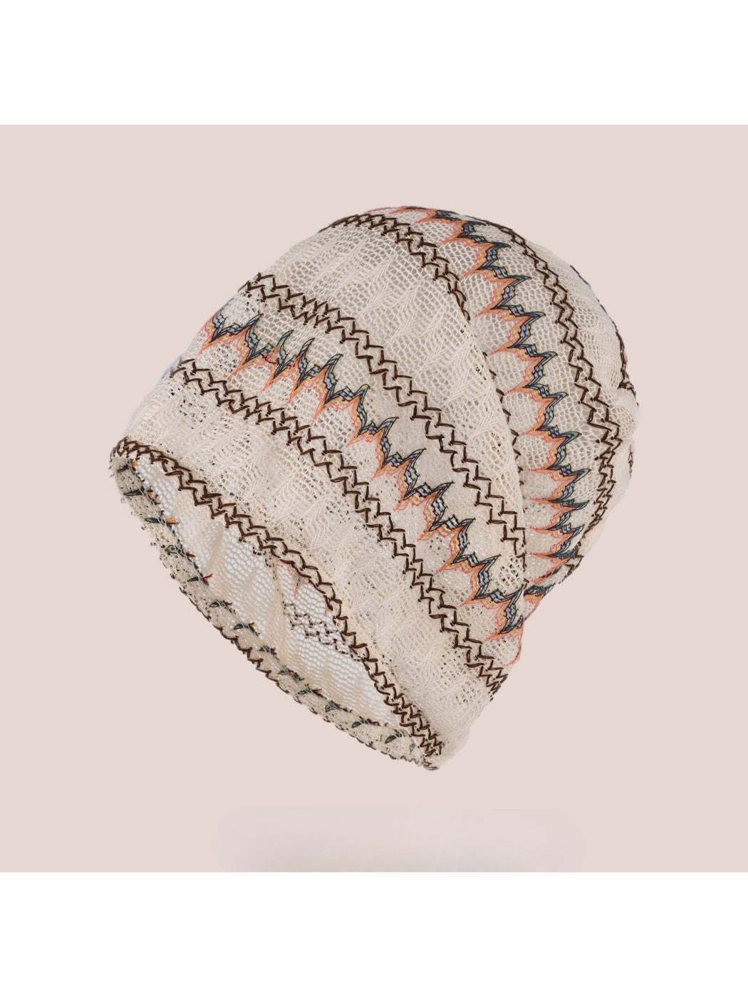 Close-up of Haila vintage slouchy beanie showing hollow knit pattern in beige