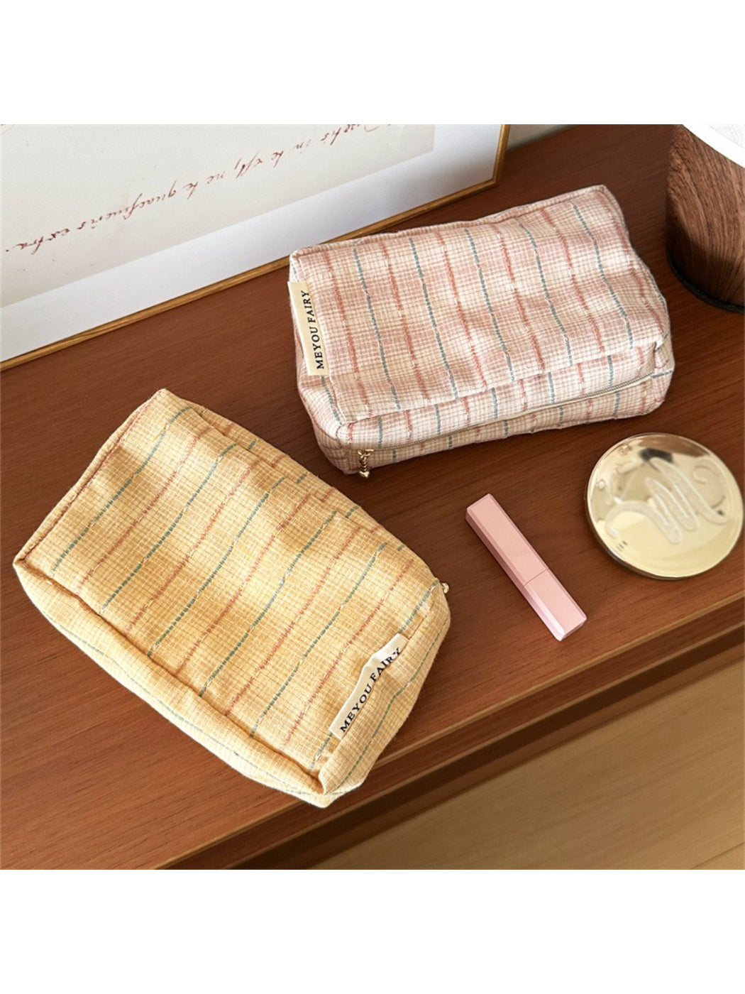 Cosbai pastel plaid cosmetic bag with soft pink and blue tones on white background