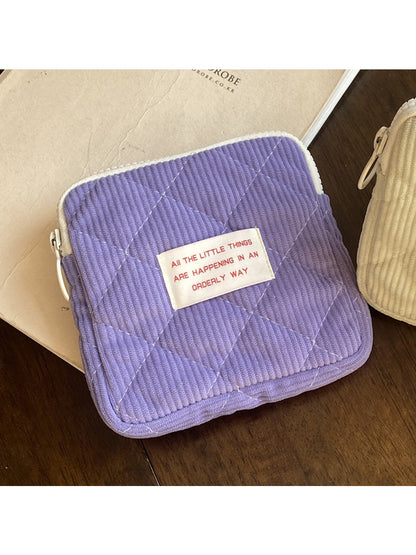 Cosbai cartoon print mini storage pouch shown with zipper partially open