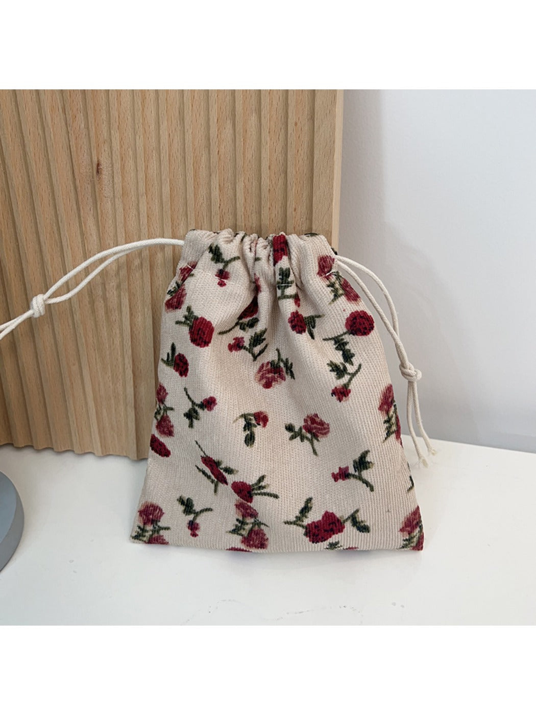 Cosbai Floral Pouch with colorful flowers arranged across surface