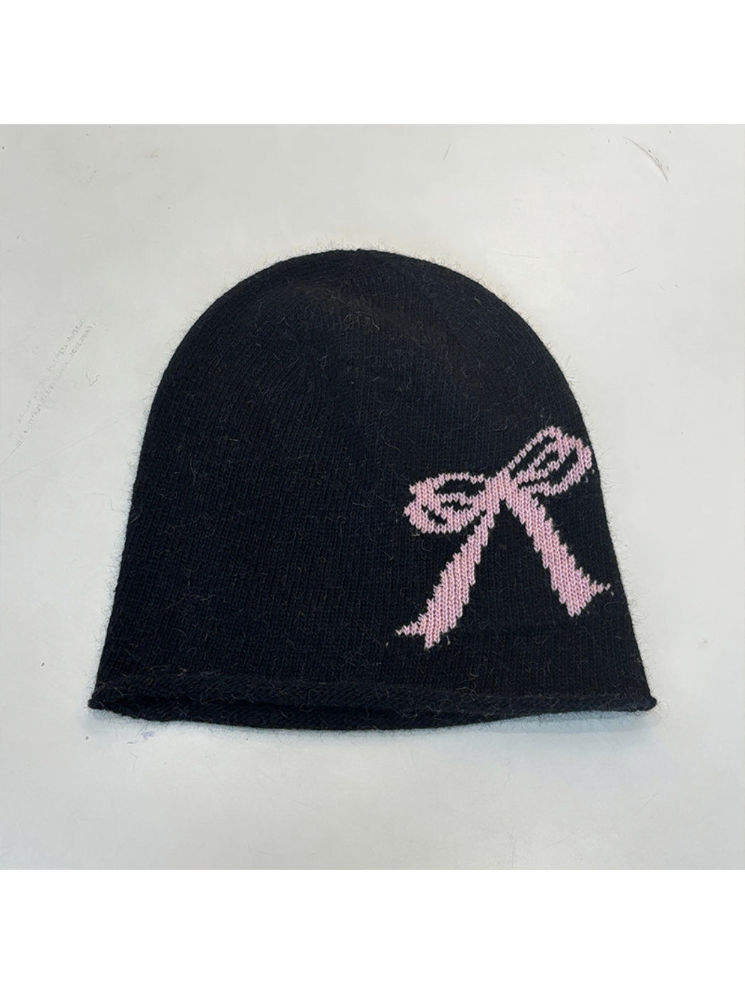 Haila - Bow and Cross Motif Rolled Edge Knit Beanie