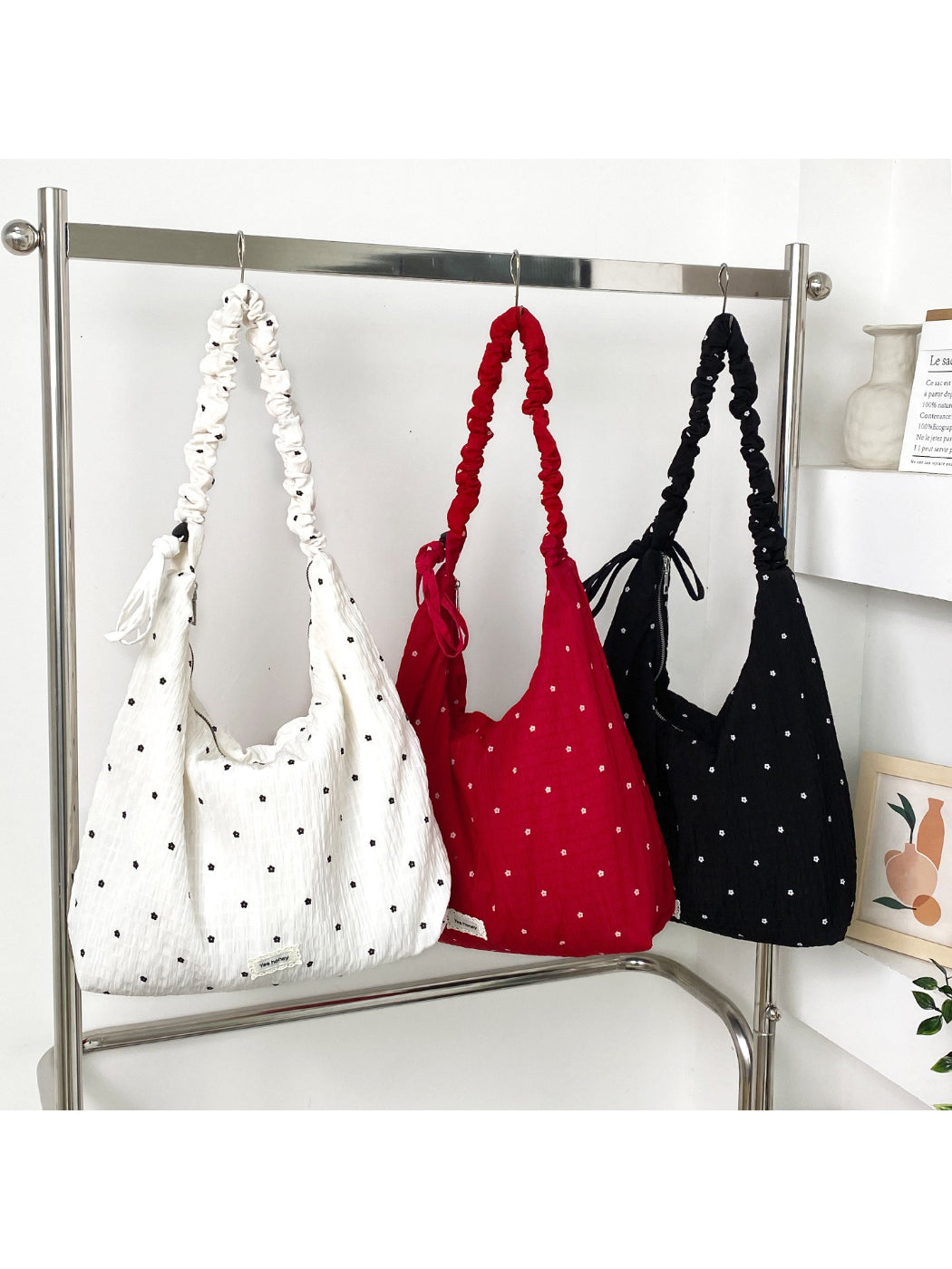 Side view of Cosbai ruched strap slouchy shoulder bag showing soft texture