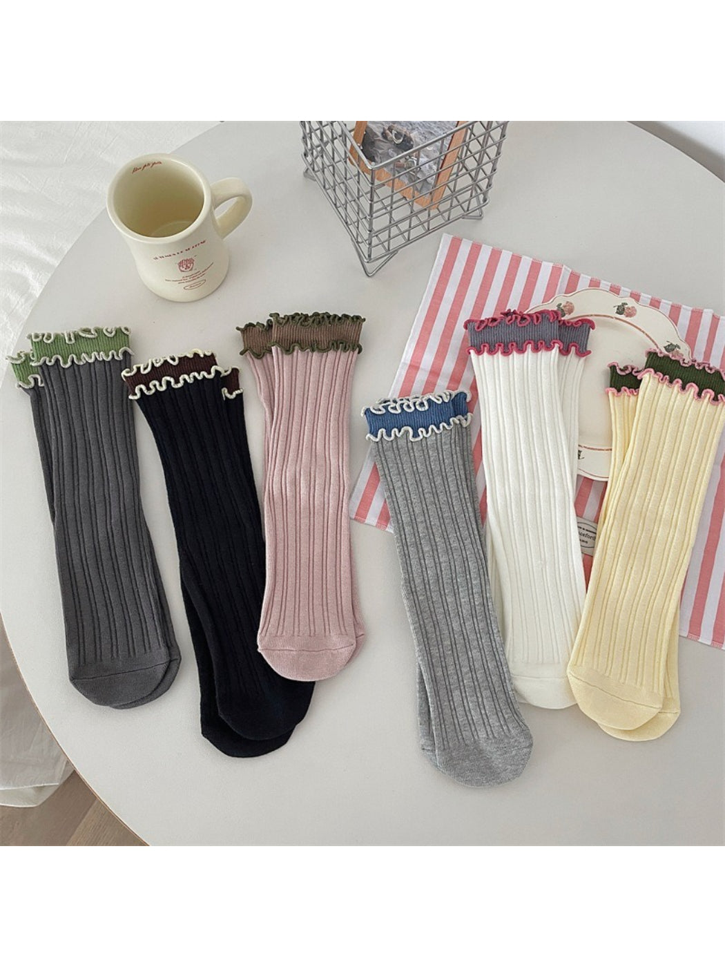 Rufia ruffle color block crew socks displayed flat showing multicolor design