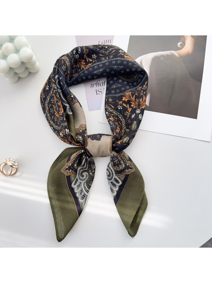 Army Green paisley scarf tied around a display bust