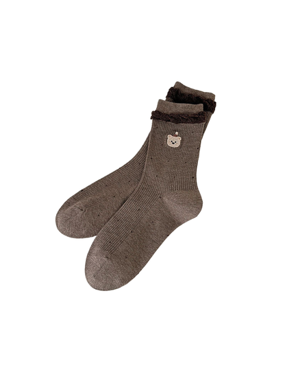 Coffee ribbed bear-motif socks with small dark dots and dark braided cuff trim.