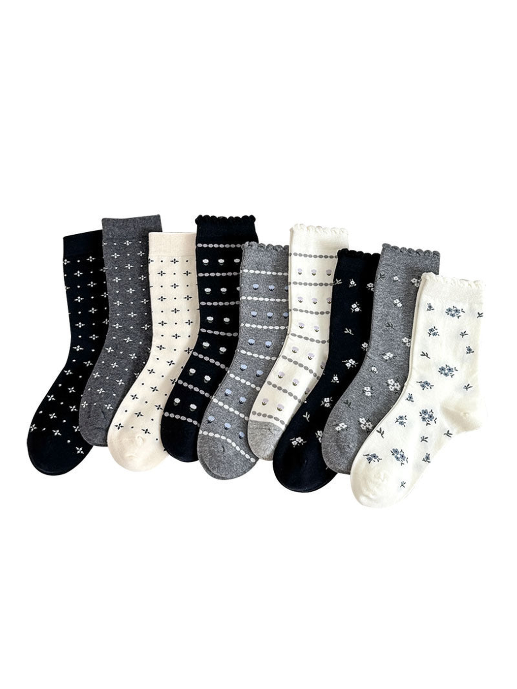Multiple crew socks in black, gray, cream, and beige patterns displayed together