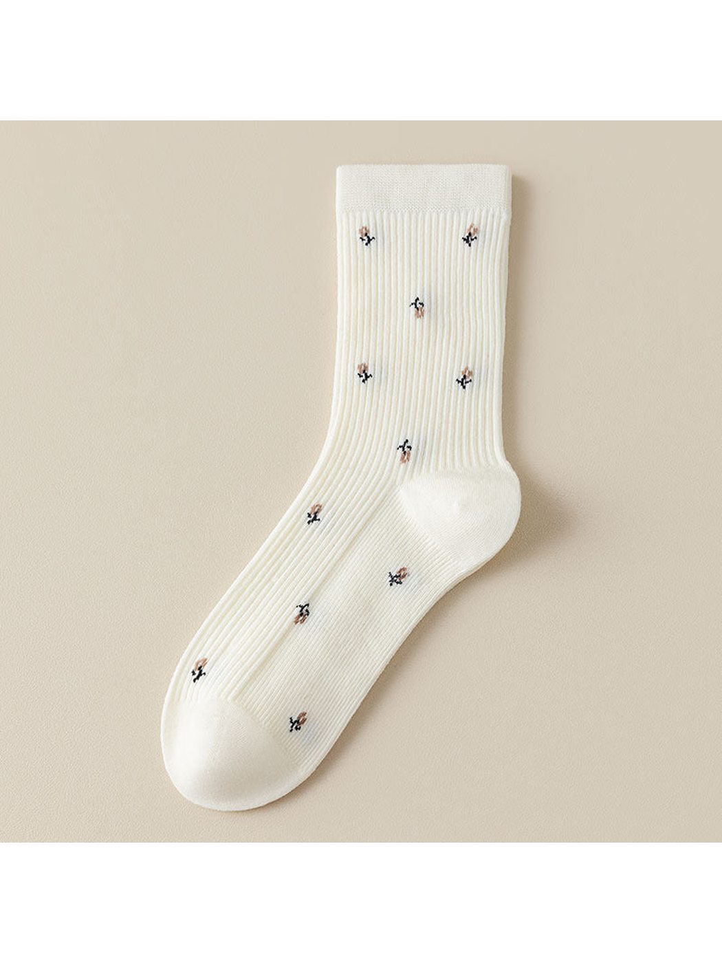 White ribbed crew socks with multicolor motifs