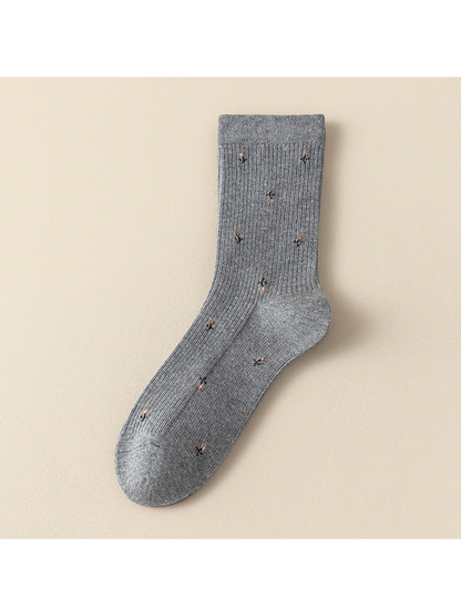 Gray ribbed crew socks with multicolor motifs
