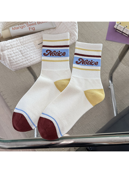 Yellow Color crew socks with striped cuff and contrasting heel and toe panels
