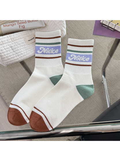 Green Color crew socks with striped cuff and contrasting heel and toe panels