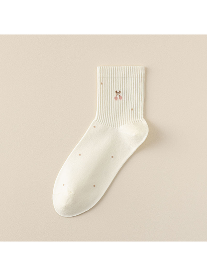 Cherry crew sock with ribbed cuff and scattered dot details