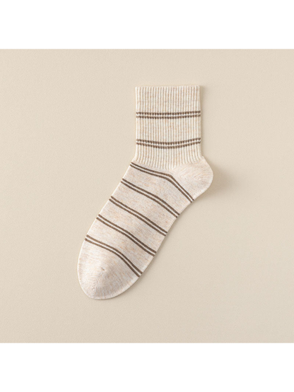 Striped crew sock with brown horizontal stripes and shaped heel