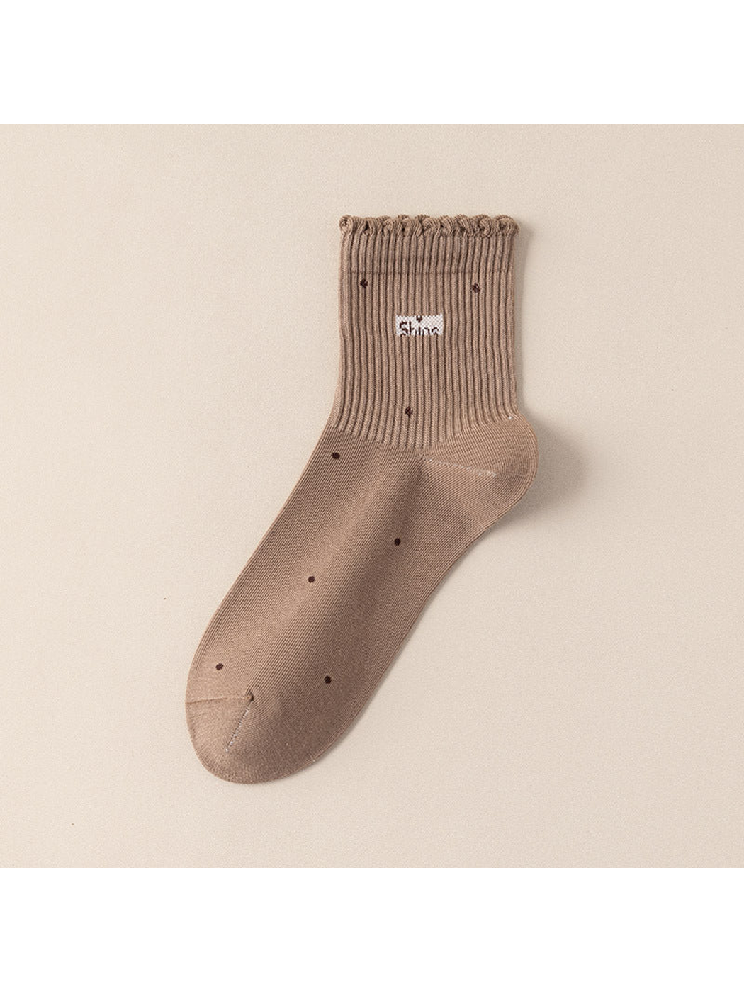 Khaki crew sock with scattered dot motifs and a scalloped ribbed cuff