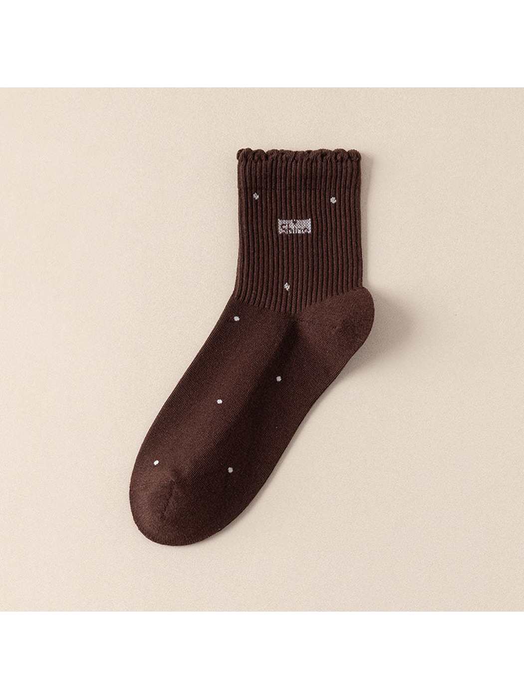 Coffee crew sock with scattered dot motifs and a scalloped ribbed cuff