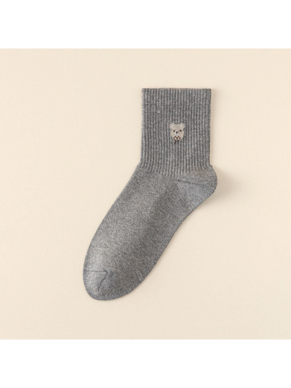 Bear Face style dark gray crew sock with a small bear face motif and ribbed cuff