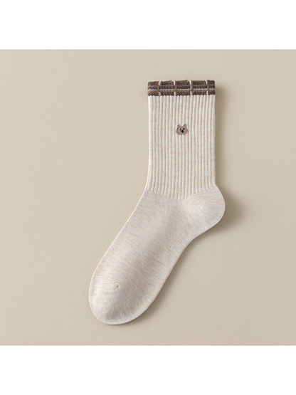 Stripes crew sock with a striped cuff, fine vertical lines and a small cat motif