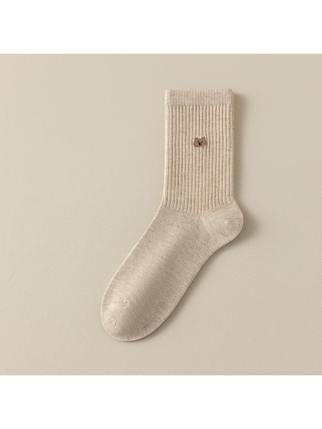 Mottled crew sock with a ribbed leg and a small cat motif