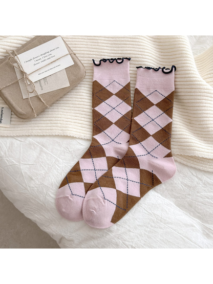 Light Pink socks with brown argyle diamonds and dark blue wavy cuffs